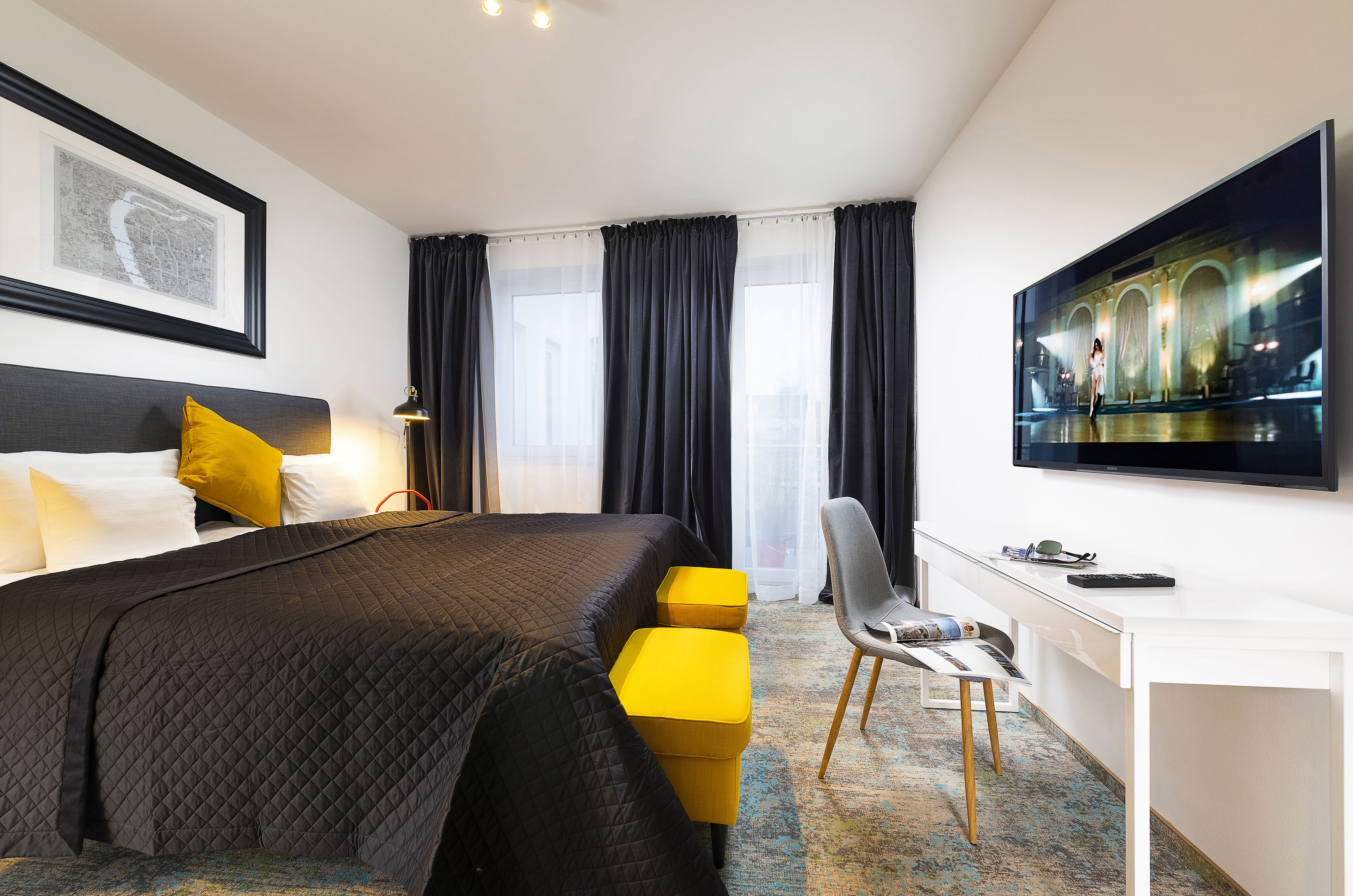 guest room at Bo33 Hotel Family & Suites